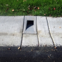 Installed Curb Drain