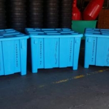 Stenciled Bulk Storage Containers Lined Up